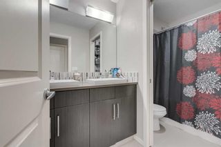 Photo 20: 311 Ascot Circle SW in Calgary: Aspen Woods Row/Townhouse for sale : MLS®# A2058217