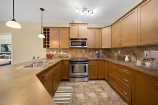 Photo 7: 211 35 Aspenmont Heights SW in Calgary: Aspen Woods Apartment for sale : MLS®# A2048669