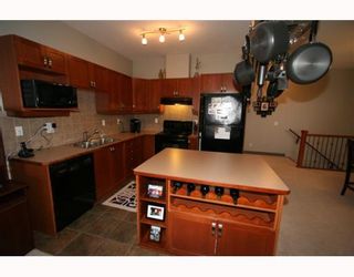 Photo 6: 502 8000 WENTWORTH Drive SW in CALGARY: West Springs Stacked Townhouse for sale (Calgary)  : MLS®# C3408202