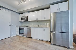 Photo 3: 606 450 8 Avenue SE in Calgary: Downtown East Village Apartment for sale : MLS®# A1190347