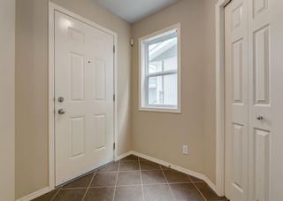 Photo 2: 148 Cougartown Close SW in Calgary: Cougar Ridge Detached for sale : MLS®# A2050763