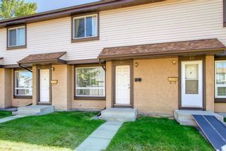 Photo 2: #64 2727 Rundleson Road NE in Calgary: Rundle Row/Townhouse for sale : MLS®# A1245194