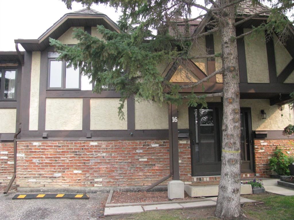 Main Photo: 16 Storybook Gardens NW in Calgary: Ranchlands Row/Townhouse for sale : MLS®# A1103228