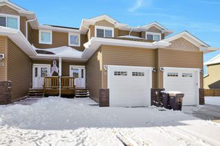 Photo 1: 18 ROWBERRY Court: Sylvan Lake Row/Townhouse for sale : MLS®# A2006970