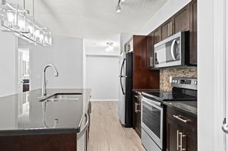Photo 2: 109 250 New Brighton Villas SE in Calgary: New Brighton Apartment for sale : MLS®# A1259706