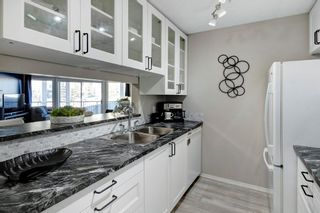 Photo 6: 302 33 Arbour Grove Close NW in Calgary: Arbour Lake Apartment for sale : MLS®# A2024734