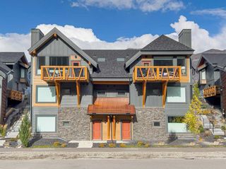 Photo 1: 201E 1200 Three Sisters Parkway SE: Canmore Row/Townhouse for sale : MLS®# A2103740