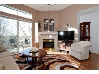 Photo 4: 311 5955 177B Street in Surrey: Cloverdale BC Condo for sale in "WINDSOR PLACE" (Cloverdale)  : MLS®# F1433073