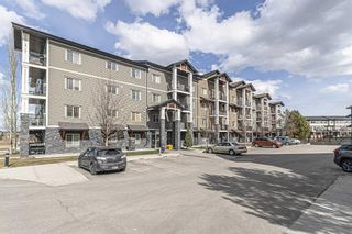 Photo 1: 1306 175 Panatella Hill NW in Calgary: Panorama Hills Apartment for sale : MLS®# A2122799