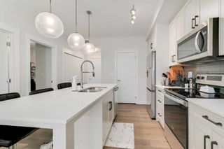 Photo 5: 311 500 Auburn Meadows Common SE in Calgary: Auburn Bay Apartment for sale : MLS®# A2127655
