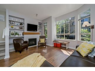 Photo 2: 64 100 KLAHANIE Drive in Port Moody: Port Moody Centre Townhouse for sale : MLS®# R2197843