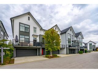 Photo 1: 64 17555 57A Avenue in Surrey: Cloverdale BC Townhouse for sale in "Hawthorne" (Cloverdale)  : MLS®# R2622213