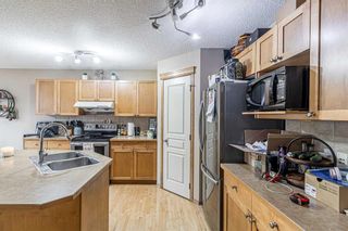 Photo 9: 115 Panamount Heights NW in Calgary: Panorama Hills Detached for sale : MLS®# A2130951