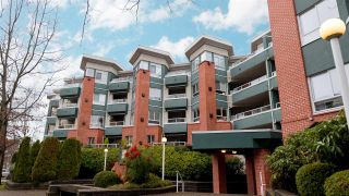 Photo 1: 102 128 W 8TH Street in North Vancouver: Central Lonsdale Condo for sale in "The Library" : MLS®# R2575197