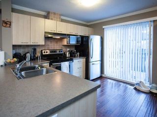 Photo 10: 44 20176 68TH Avenue in Langley: Willoughby Heights Townhouse for sale in "Steeple Chase" : MLS®# F1401877