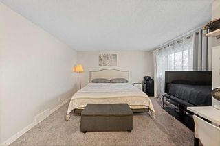 Photo 14: 221 Queenston Heights SE in Calgary: Queensland Row/Townhouse for sale : MLS®# A2125332