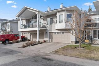 Photo 1: 131 Rocky Vista Terrace NW in Calgary: Rocky Ridge Row/Townhouse for sale : MLS®# A2123390