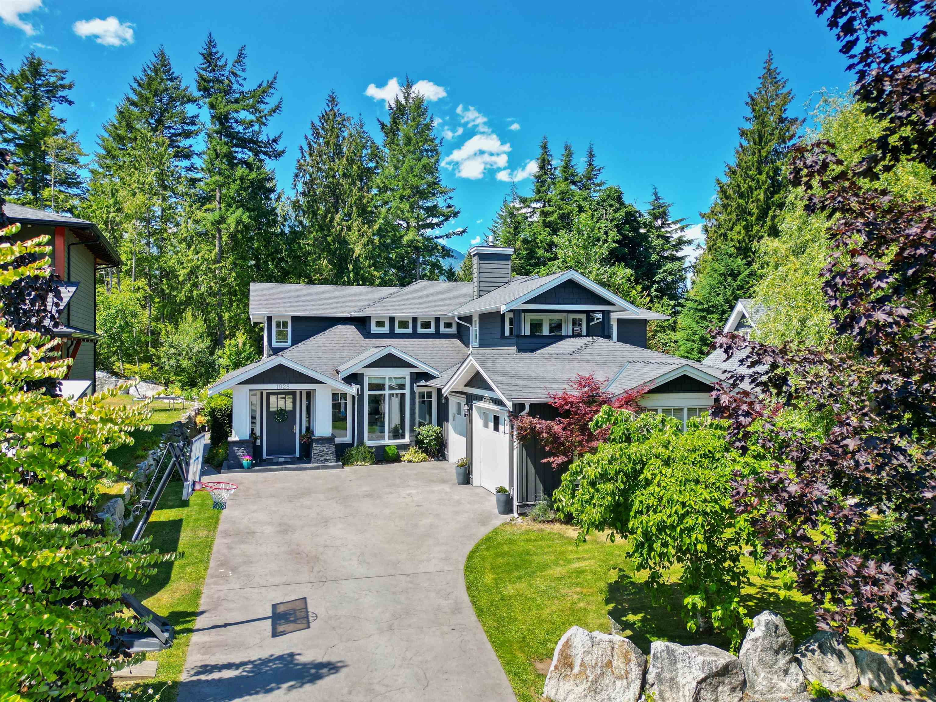 Main Photo: 1028 JAY Crescent in Squamish: Garibaldi Highlands House for sale in "Thunderbird Creek" : MLS®# R2801688