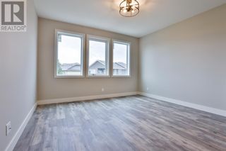 Photo 11: 25 Prairie Sunset Avenue in Taber: House for sale : MLS®# A1258442