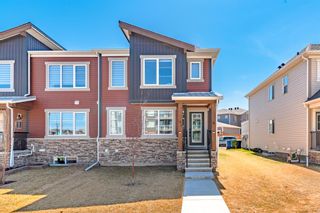 Photo 1: 1215 140 Avenue NW in Calgary: Carrington Row/Townhouse for sale : MLS®# A2043557