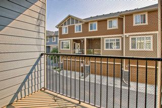 Photo 13: 227 Panatella Walk NW in Calgary: Panorama Hills Row/Townhouse for sale : MLS®# A2074189