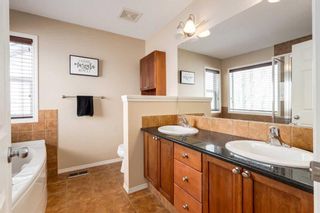 Photo 25: 200 Cougartown Close SW in Calgary: Cougar Ridge Detached for sale : MLS®# A2124049