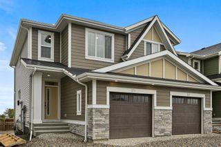 Main Photo: 171 Creekstone Way SW in Calgary: C-168 Semi Detached (Half Duplex) for sale : MLS®# A2125673
