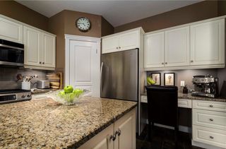 Photo 10: 344 Sienna Park Drive SW in Calgary: Signal Hill Detached for sale : MLS®# A1224046