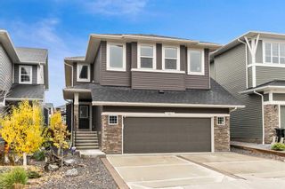 Photo 1: 84 Crestbrook Way SW in Calgary: Crestmont Detached for sale : MLS®# A2093285