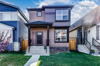 Photo 1: 88 Wolf Creek Manor SE in Calgary: C-281 Detached for sale : MLS®# A1258647