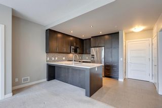 Photo 8: 211 145 Burma Star Road SW in Calgary: Currie Barracks Apartment for sale : MLS®# A2053707