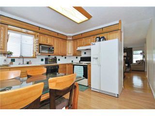 Photo 2: 1194 SHELTER Crescent in Coquitlam: New Horizons House for sale : MLS®# V1003813