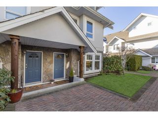 Photo 1: 15 15432 16A Avenue in Surrey: King George Corridor Townhouse for sale in "Carlton Court" (South Surrey White Rock)  : MLS®# R2659421
