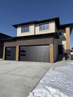 Main Photo: 4406 Wolf Willow Place in Regina: The Creeks Residential for sale : MLS®# SK959163