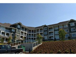 Photo 2: 315 16398 64 Avenue in Surrey: Cloverdale BC Condo for sale in "The Ridge At Bose Farms" (Cloverdale)  : MLS®# R2023181