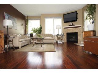 Photo 1: 408 6707 SOUTHPOINT Drive in Burnaby: South Slope Condo for sale in "MISSION WOODS" (Burnaby South)  : MLS®# V1015325