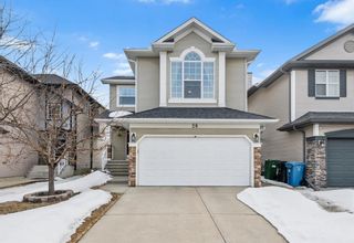 Photo 1: 28 Cougarstone Square SW in Calgary: Cougar Ridge Detached for sale : MLS®# A2036427