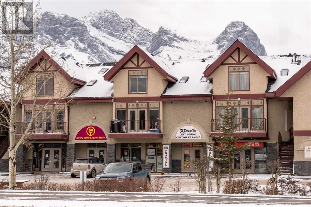 Main Photo: 8, 1302 Bow Valley Trail in Canmore: Condo for sale : MLS®# A2106986