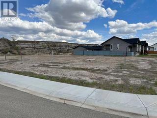 Photo 1: 140 10 Avenue  SE in Drumheller: Vacant Land for sale : MLS®# A1219797