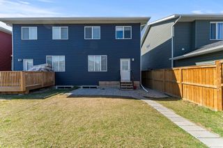 Photo 32: 97 Red Embers Place NE in Calgary: Redstone Semi Detached (Half Duplex) for sale : MLS®# A2130124