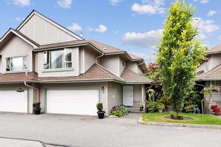 Photo 1: 12 1255 RIVERSIDE Drive in Port Coquitlam: Riverwood Townhouse for sale : MLS®# R2703581