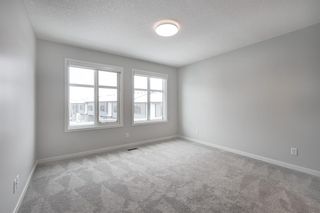 Photo 18: 146 42 Cranbrook Gardens SE in Calgary: Cranston Row/Townhouse for sale : MLS®# A2010110