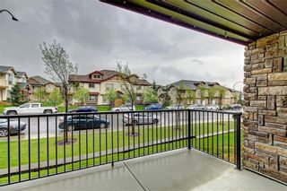 Photo 4: 2208 60 Panatella Street NW in Calgary: Panorama Hills Apartment for sale : MLS®# A1243824