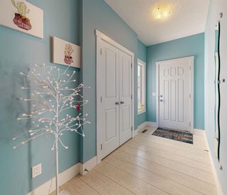 Photo 4: 33 Covecreek Mews NE in Calgary: Coventry Hills Detached for sale : MLS®# A2020019