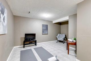 Photo 21: 77 330 Canterbury Drive SW in Calgary: Canyon Meadows Row/Townhouse for sale : MLS®# A2074563