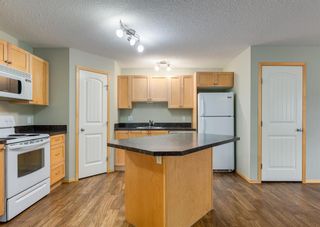 Photo 3: 102 150 Panatella Landing NW in Calgary: Panorama Hills Row/Townhouse for sale : MLS®# A2052603