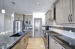 Photo 9: 210 Evansglen Drive NW in Calgary: Evanston Detached for sale : MLS®# A1080625