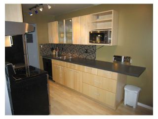 Photo 3: # 107 2424 CYPRESS ST in Vancouver: Kitsilano Condo for sale in "Cypress Garden" (Vancouver West)  : MLS®# V1009052