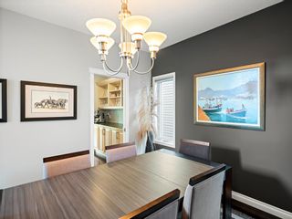 Photo 7: 39 Cougar Plateau Place SW in Calgary: Cougar Ridge Detached for sale : MLS®# A2053935