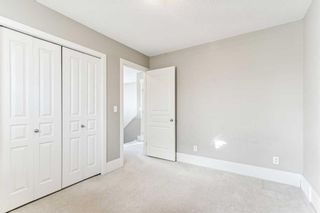 Photo 24: 189 Cougartown Circle SW in Calgary: Cougar Ridge Detached for sale : MLS®# A2107107